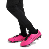 Kids Chelsea FC training tracksuit black pants paired with bright pink Nike soccer cleats