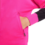 Close-up of a hand in the side pocket of a pink kids Chelsea FC training tracksuit jacket