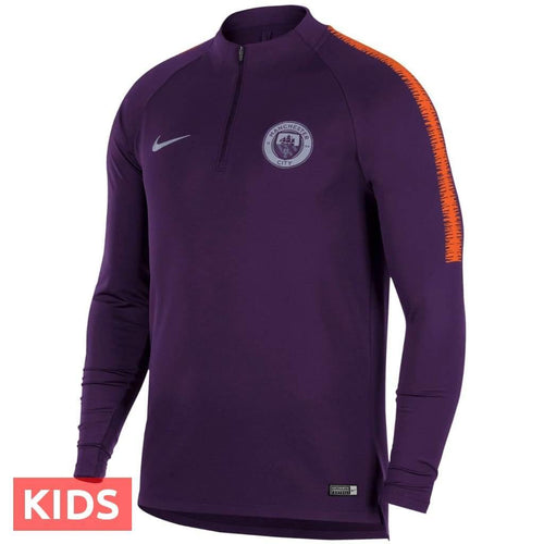 Kids Manchester City UCL training top in purple with orange stripe and Nike logo