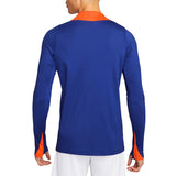 Back view of Nike Netherlands training tracksuit top in blue with orange collar and sleeve details
