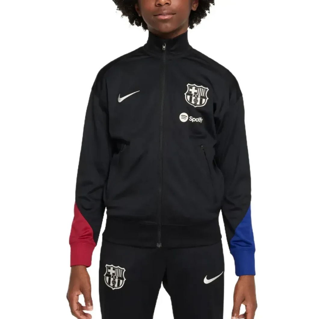 Official kids Nike Barca tracksuit in black with red and blue sleeve cuffs and club logo