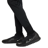 Black official kids Nike Barca tracksuit pants paired with black Nike Phantom shoes 