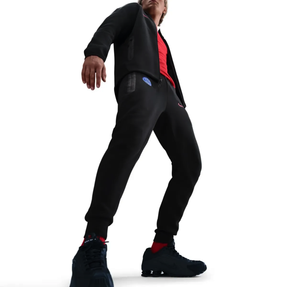 Nike PSG black Tech Fleece tracksuit 2025 26 for athletes featuring a stylish and comfortable design
