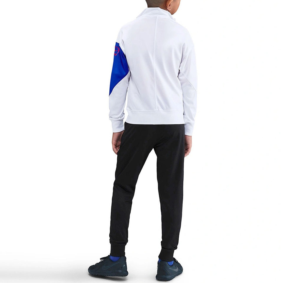 Back view of Nike PSG kids soccer tracksuit 2025 in white and black featuring comfortable fit on SoccerTracksuits.com