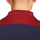 Close-up back view of Nike PSG soccer tracksuit for men in navy and burgundy colors