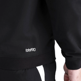 Close-up of the PSG Total 90 soccer tracksuit featuring the Total90 logo on the sleeve