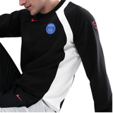 PSG Total 90 soccer tracksuit in black and white, featuring the Paris logo and Nike branding
