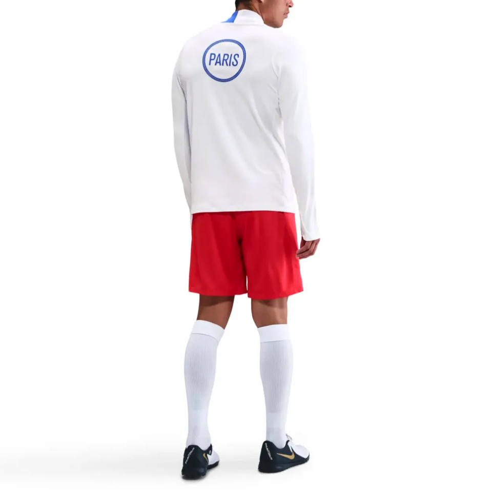 Nike PSG UCL Total 90 tracksuit featuring white top and red shorts, ideal for soccer enthusiasts