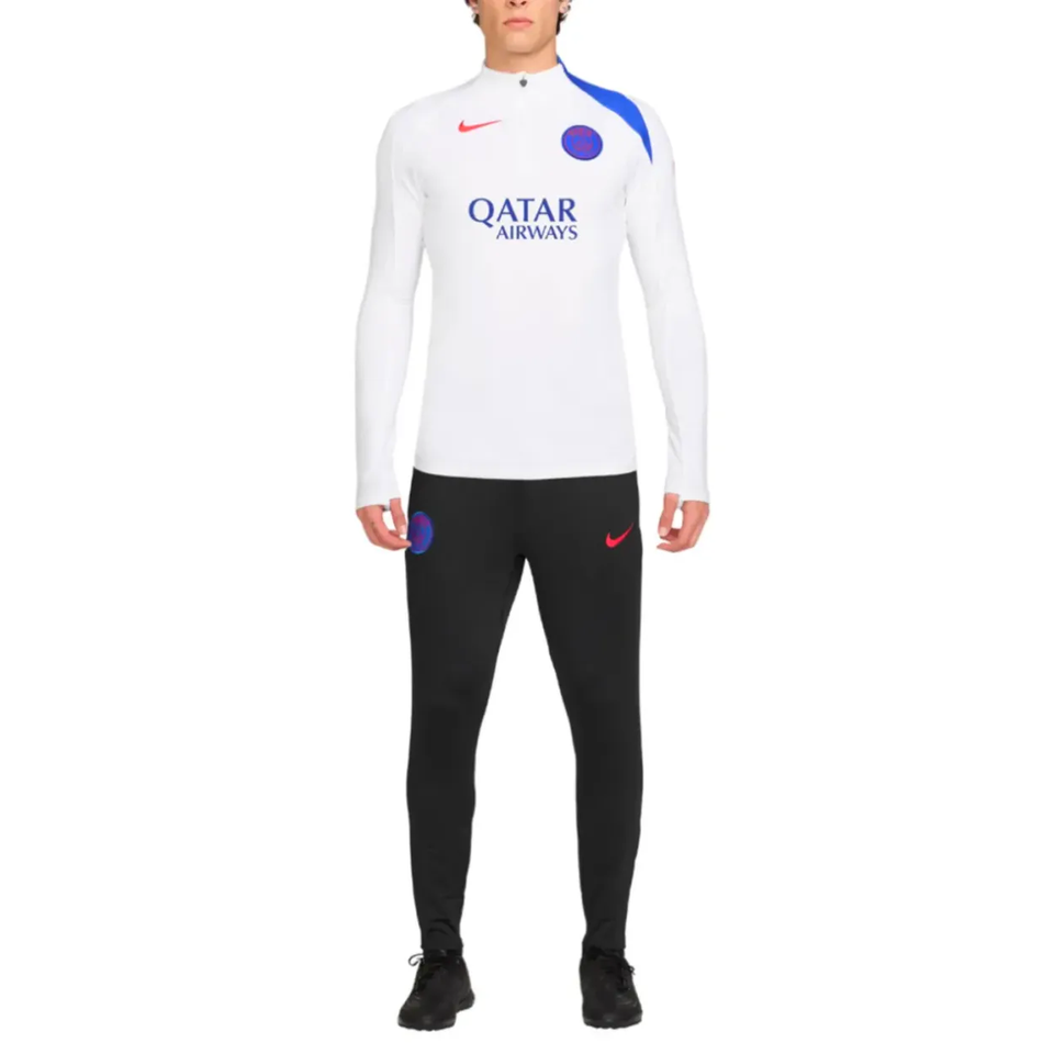 Nike PSG UCL Total 90 tracksuit featuring a white top and black pants for stylish sportswear
