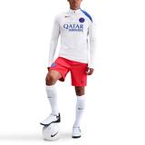 Nike PSG UCL Total 90 tracksuit featuring a white top and red shorts for ultimate comfort and style