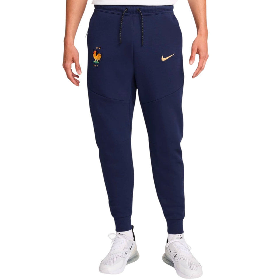Nike tech fleece tracksuit France 2024 navy blue pants with French team emblem and Nike logo