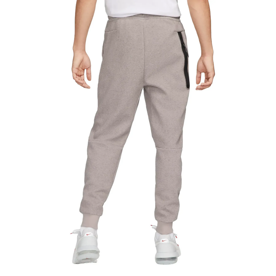 Back view of grey Tottenham Hotspur Tech Fleece tracksuit pants with black zipper pocket