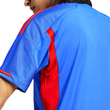 Back view of the Olympique Lyon away jersey 2023 24 featuring vibrant blue and red design details