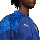 Close-up of Olympique Marseille 2024 blue training tracksuit featuring stylish design and Puma branding