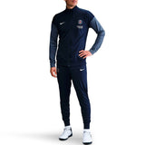 Paris Saint-Germain 2025 soccer tracksuit in navy and grey with logo and comfortable fit for fans