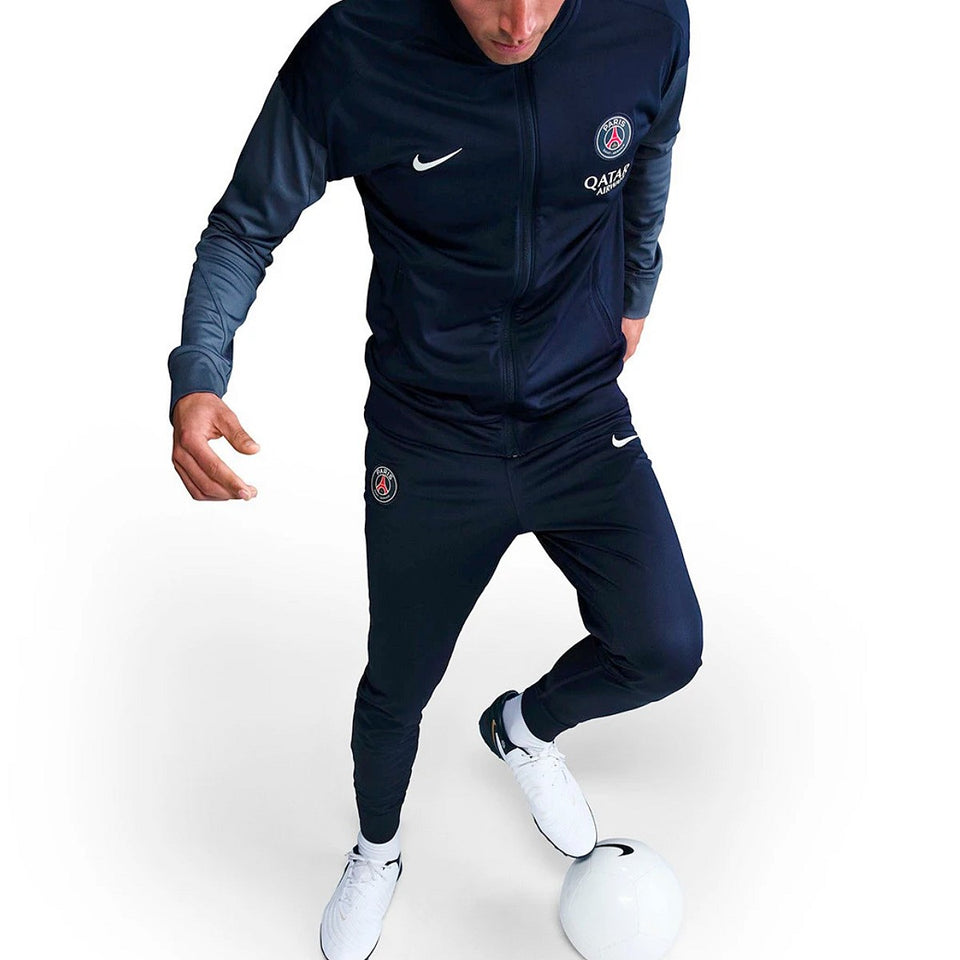 Paris Saint-Germain 2025 soccer tracksuit in navy with Nike logo, designed for athletes and fans