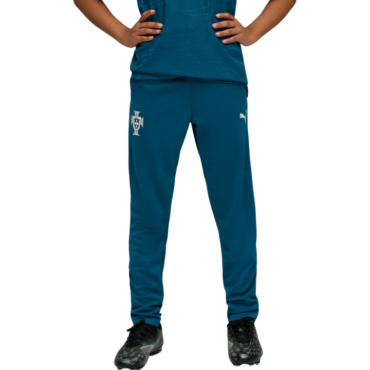 Teal Puma youth soccer pants with logo detail and elastic waistband