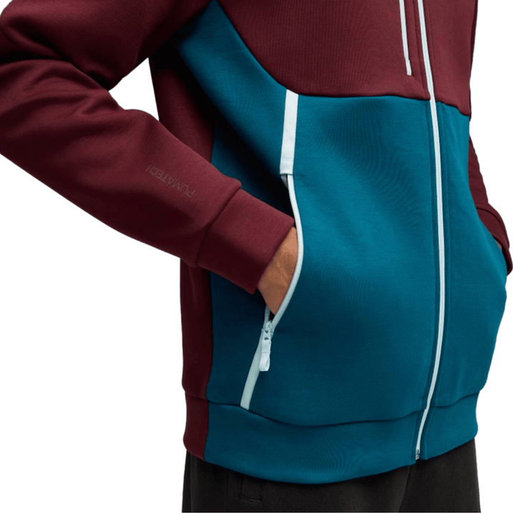 Men's zip-up hoodie in burgundy and teal with side pockets and contrasting zipper details