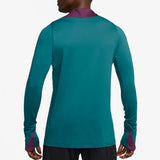Back view of a teal PSG training sweat top 2024 with long sleeves and thumbholes for comfort