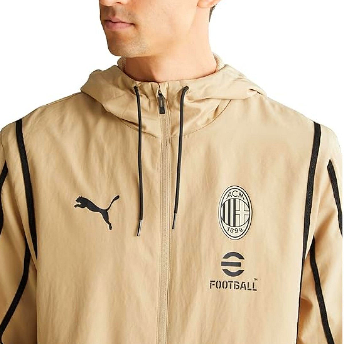 Puma AC Milan gold presentation suit featuring a hooded jacket and logo for soccer fans