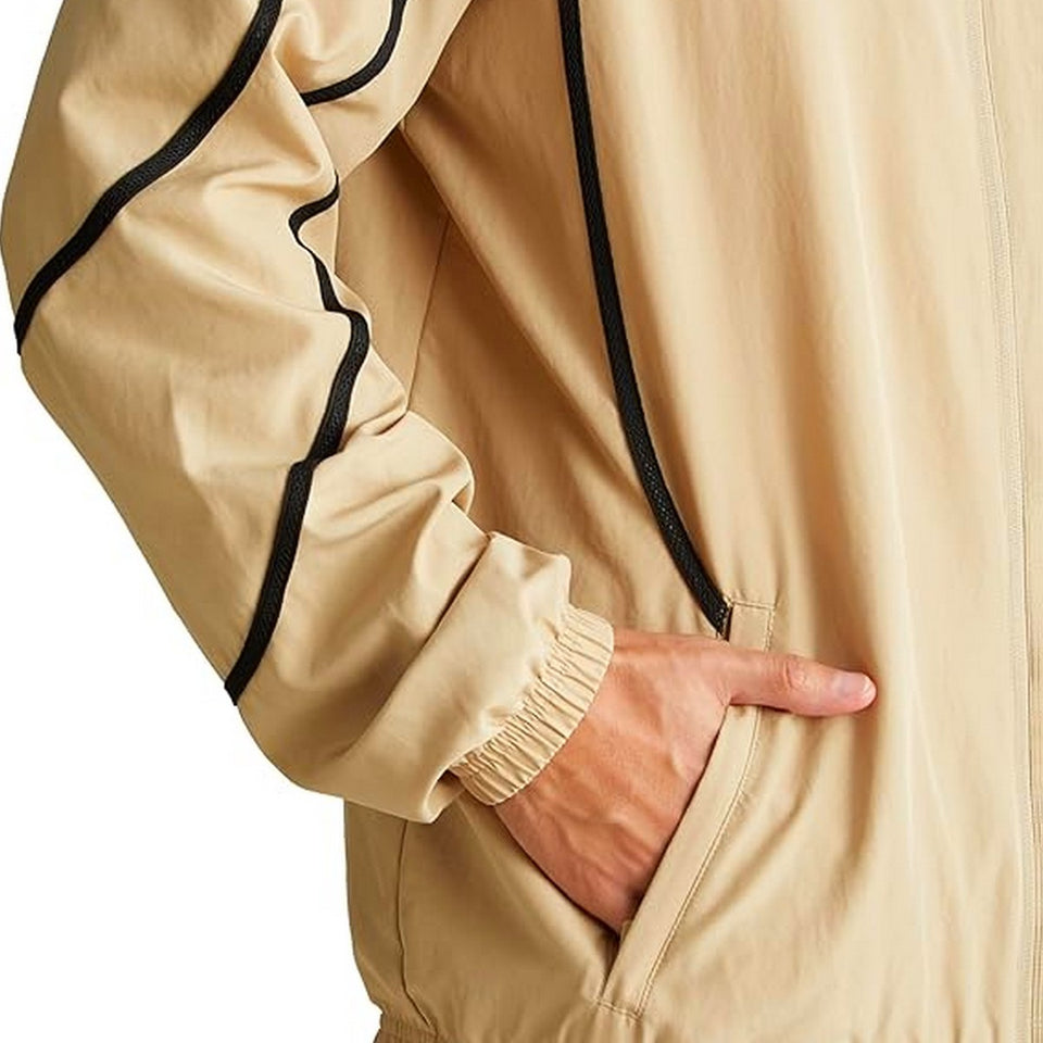 Puma AC Milan gold presentation suit featuring a stylish design and comfortable fit for sports enthusiasts