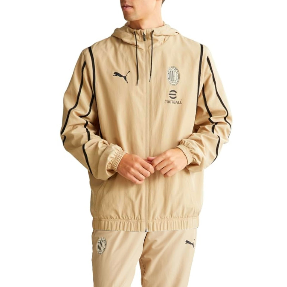 Puma AC Milan gold presentation suit featuring a stylish hooded jacket and matching pants