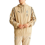 Puma AC Milan gold presentation suit featuring a stylish hooded jacket and matching pants