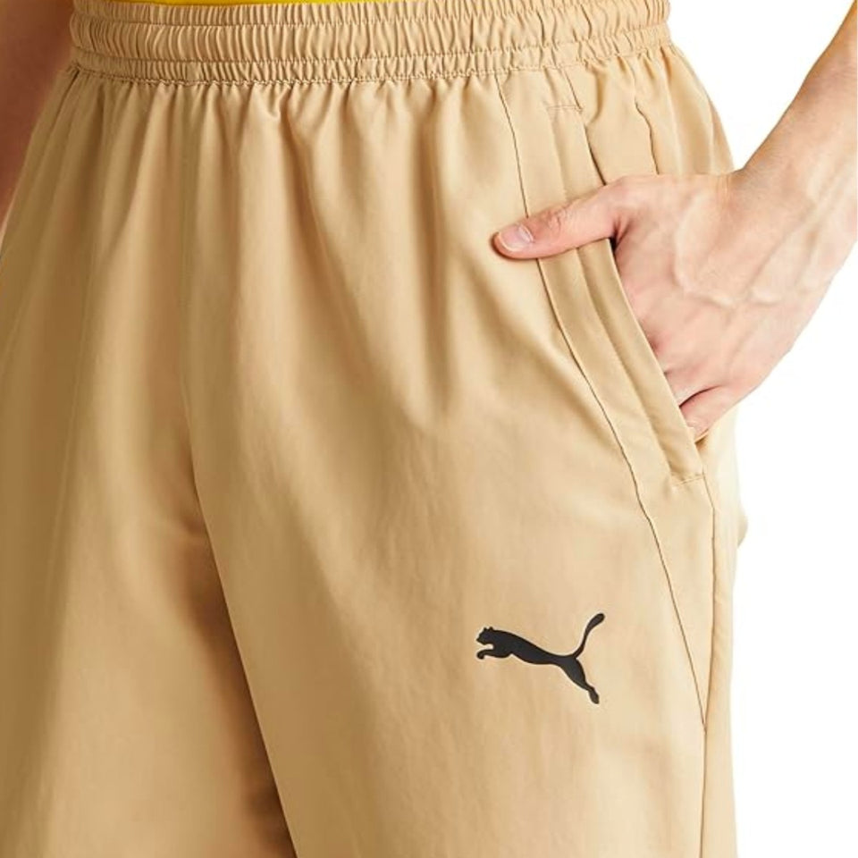 Puma AC Milan gold presentation suit featuring lightweight fabric and comfortable fit with pockets