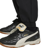 Puma AC Milan presentation suit 2025 26 featuring sleek black pants and stylish sneakers for athletic wear