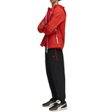 Puma AC Milan presentation suit 2025 26 featuring a red jacket and black pants with stylish design