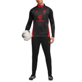 Puma AC Milan training tracksuit 2025 26 featuring a sleek black design with red accents