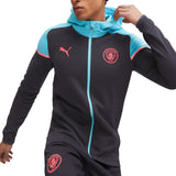 Puma Man City hooded tracksuit in black and blue with pink accents and Manchester City logo