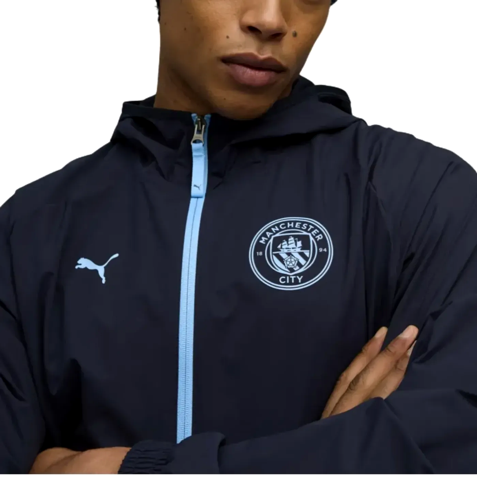 Puma Manchester City presentation tracksuit jacket in black with logo and hood for sports enthusiasts