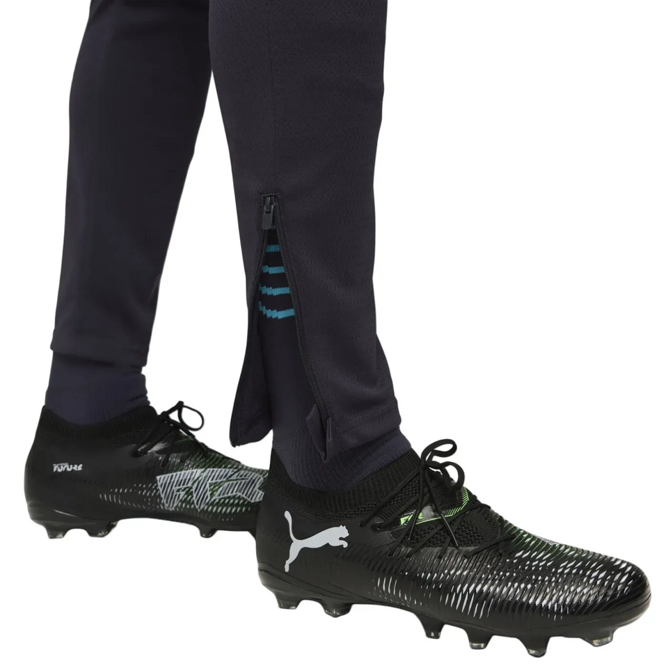 Close-up of the Olympique Marseille training tracksuit 2025 26 featuring zippered pants and stylish design