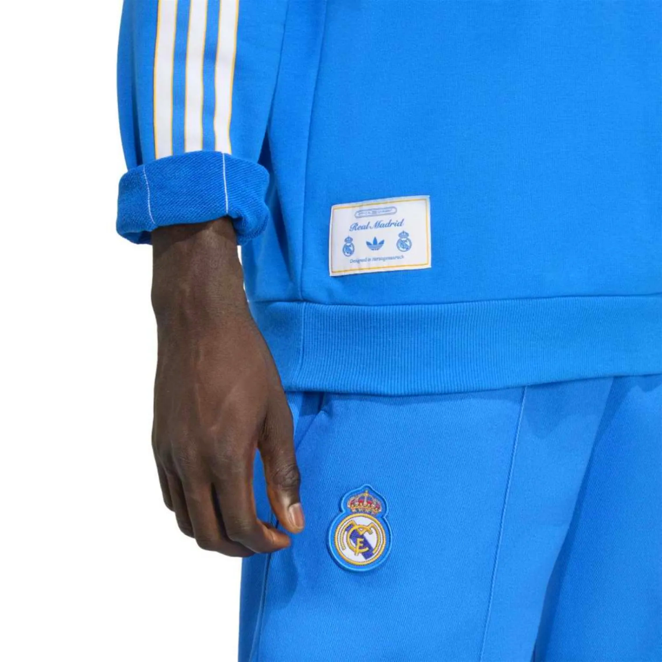 Real Madrid Adidas Originals tracksuit 2025 featuring a blue design and iconic branding details