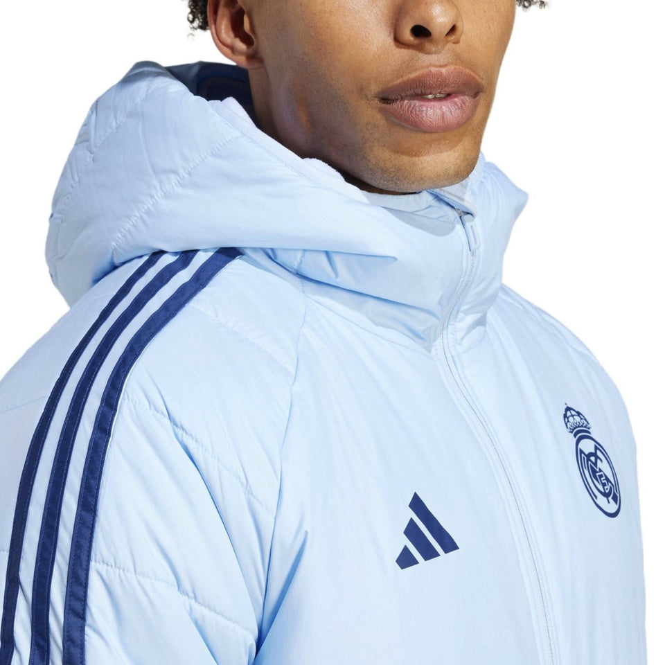 Light blue Real Madrid padded bench jacket 2024 with hood and three stripes on sleeves