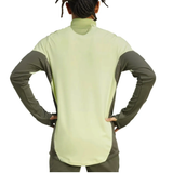 Back view of the Real Madrid training tracksuit 2025 in green and gray with a sleek design