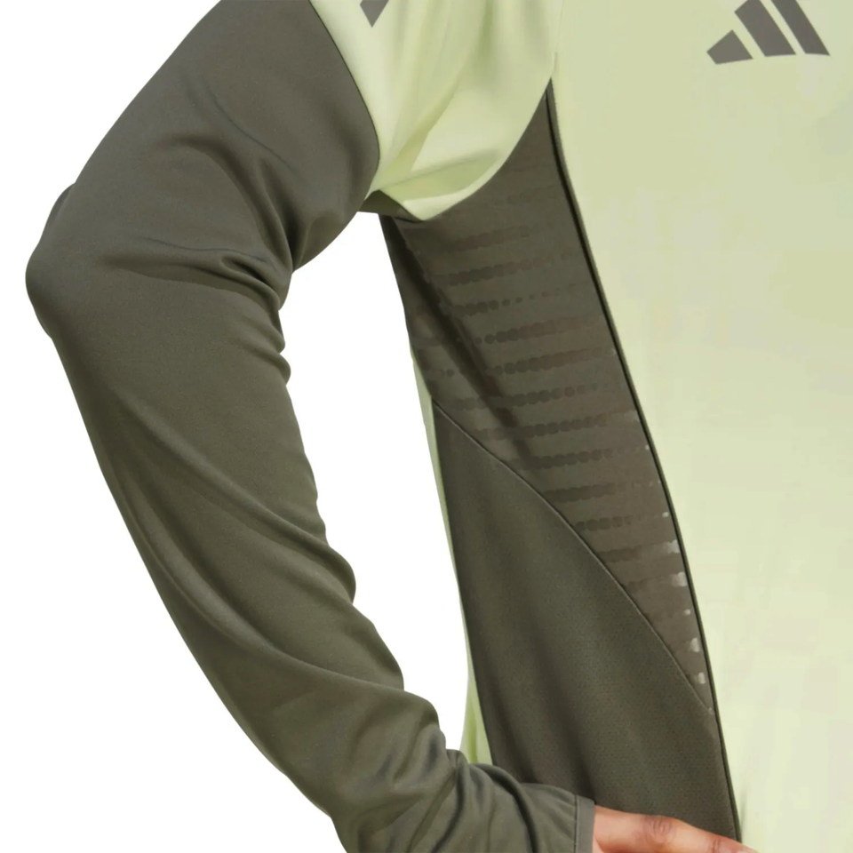 Close-up of the sleeve detail on the Real Madrid training tracksuit 2025 in vibrant colors and modern design
