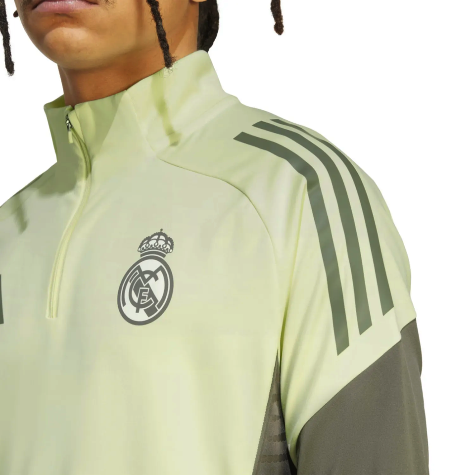 Real Madrid training tracksuit 2025 in vibrant yellow with iconic logo and stylish design