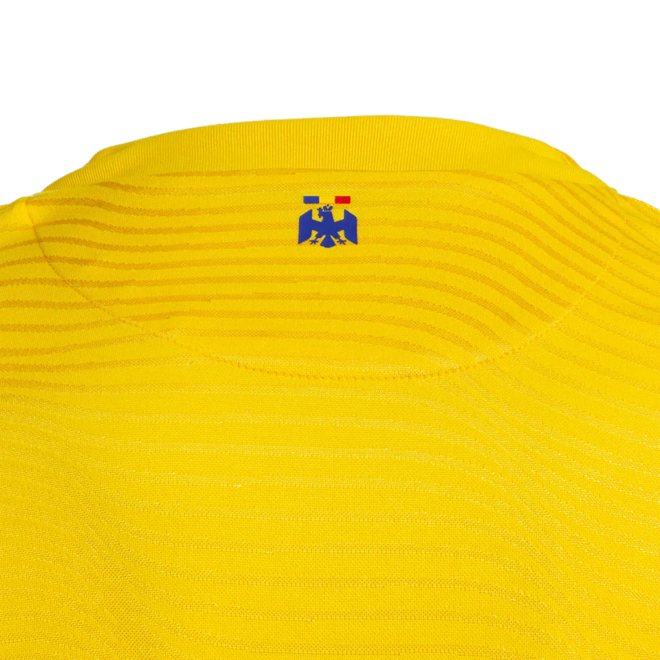 Back view of Romania national team jersey Joma in bright yellow with emblem detail