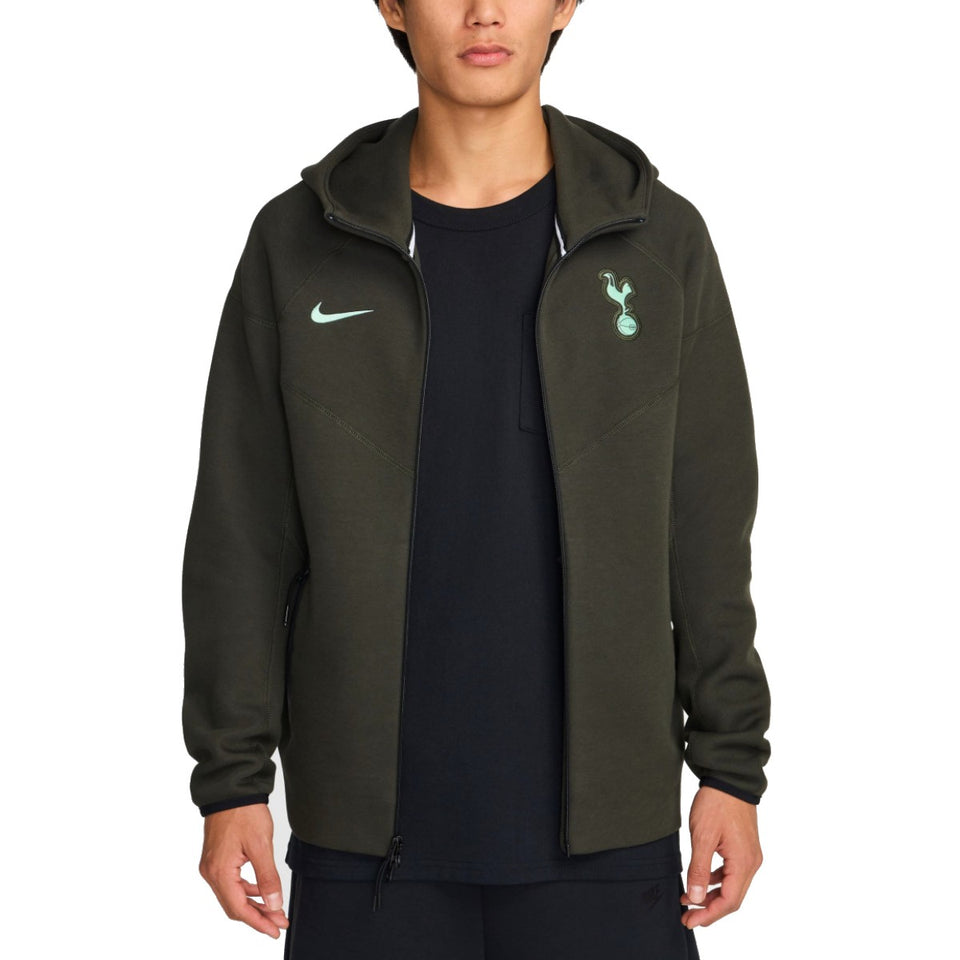 Tottenham Hotspur Nike Tech Fleece tracksuit jacket in dark green with team logo and Nike swoosh