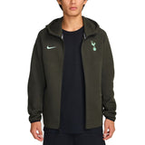 Tottenham Hotspur Nike Tech Fleece tracksuit jacket in dark green with team logo and Nike swoosh