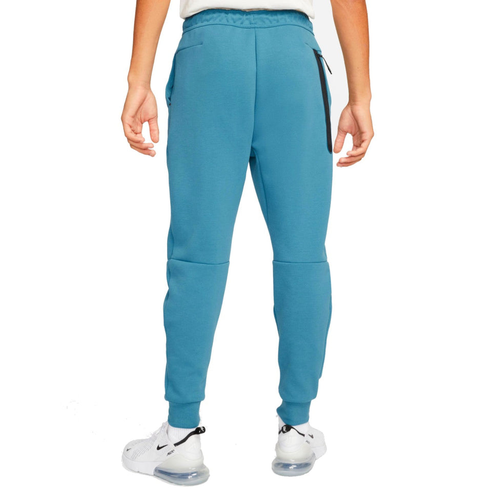 Back view of Tottenham Hotspur tech fleece pants 2022 in teal with elastic waist and pockets