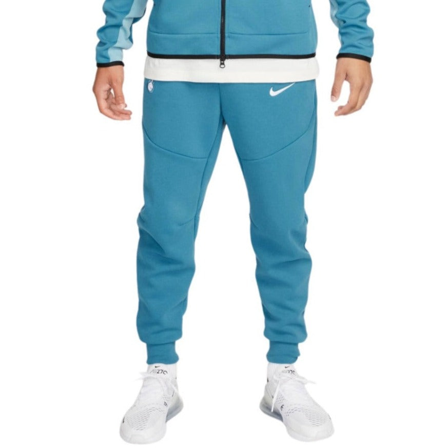 Men's Nike Tottenham Hotspur tech fleece pants 2022 in blue, designed for comfort and performance.