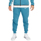 Men's Nike Tottenham Hotspur tech fleece pants 2022 in blue, designed for comfort and performance.