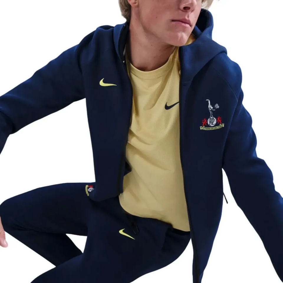 Tottenham Hotspur UCL Tech Fleece tracksuit in navy with logo and comfortable design on SoccerTracksuits.com