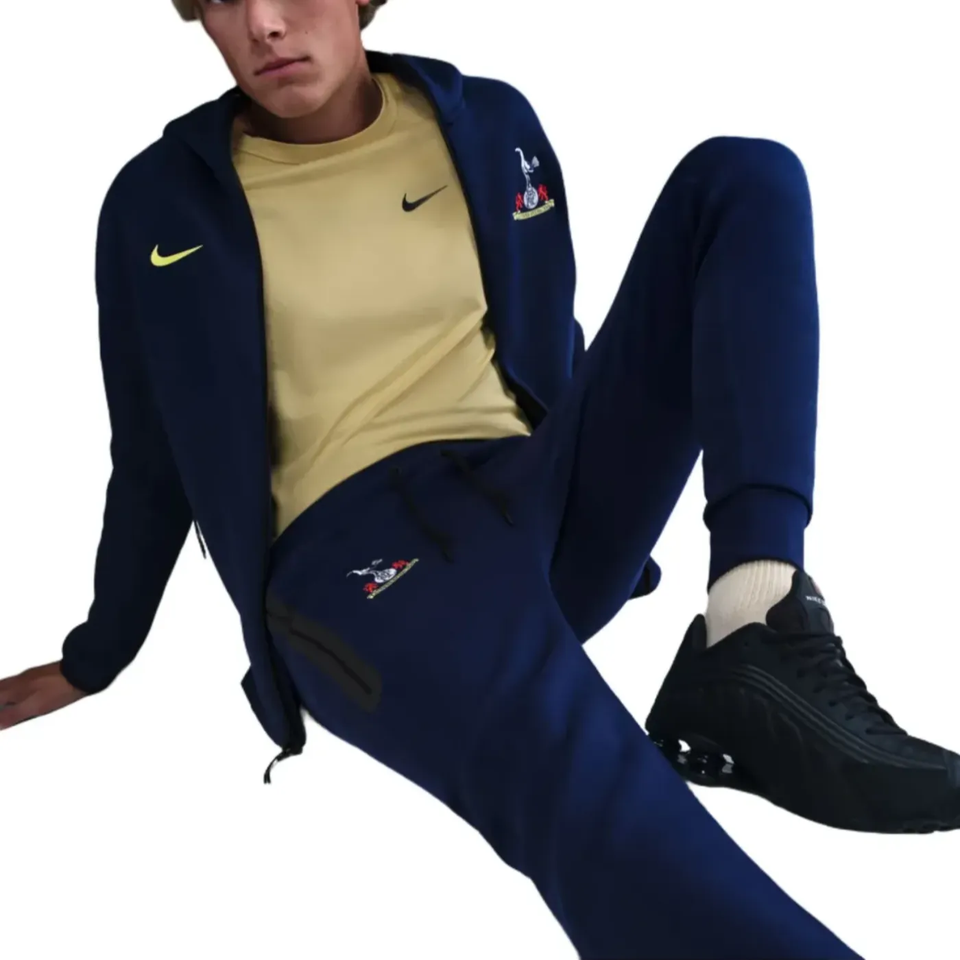 Tottenham Hotspur UCL Tech Fleece tracksuit in navy with Nike logo, ideal for fans and sporty wear