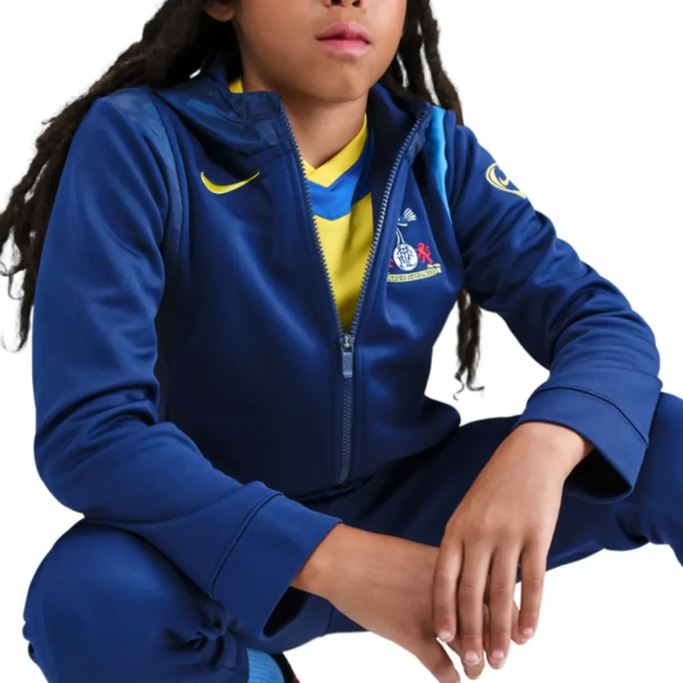 Tottenham Hotspur youth tracksuit 2025 26 in navy with team logo and zip-up hoodie for young fans