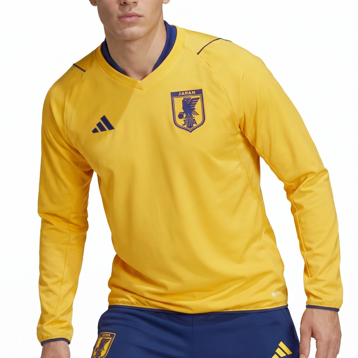 Yellow and blue Japan windbreaker with Adidas logo on a white background