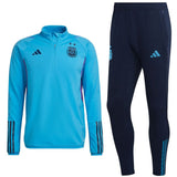 Adidas Argentina training tracksuit 2022 featuring a blue top and dark pants for athletes